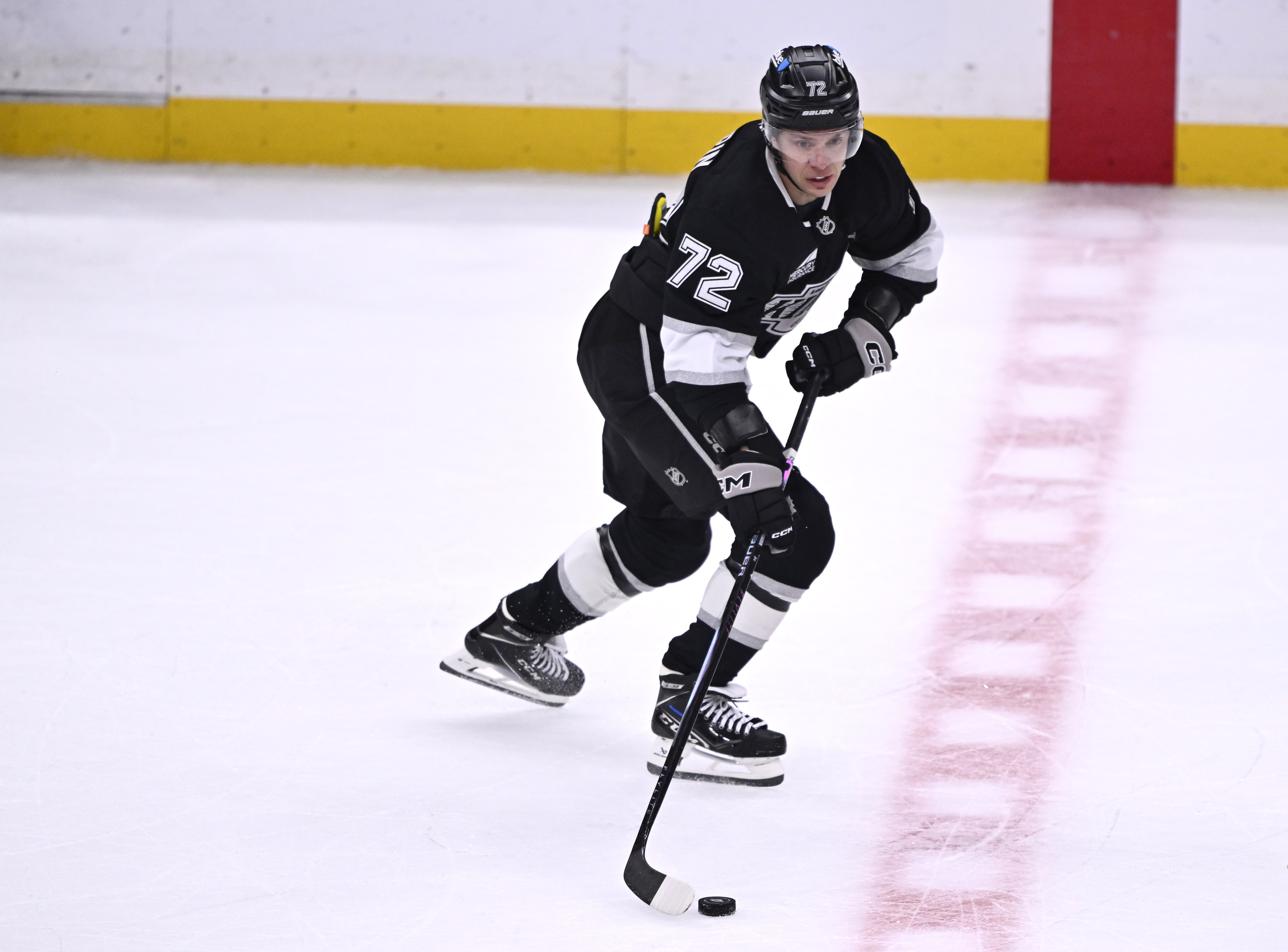 New Kings forward Artemi Panarin controls the puck during the...