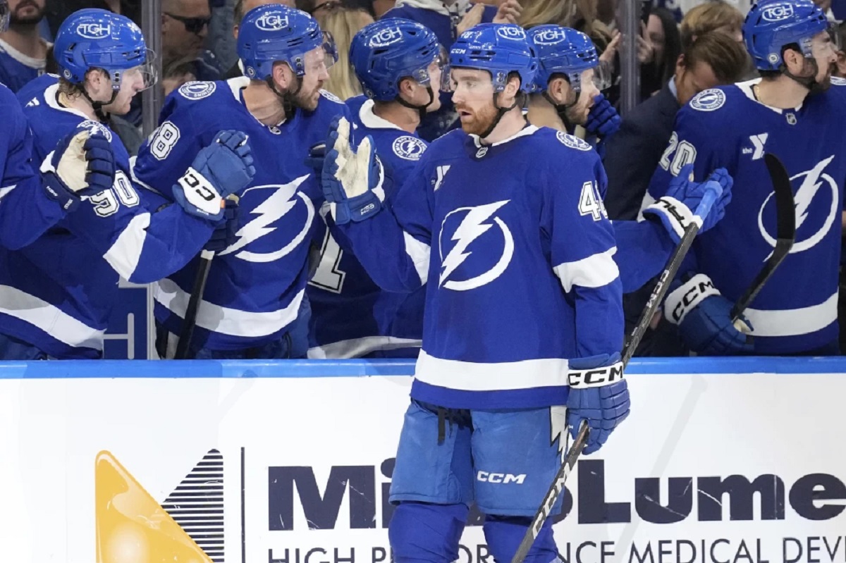 Tampa Bay Lightning defenseman Nick Perbix (48) celebrates with the bench after his goal against the Toronto Maple Leafs during the first period of an NHL hockey game Wednesday, April 9, 2025, in Tampa, Fla. (AP Photo/Chris O'Meara)
