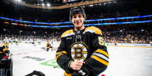 Matthew Poitras skating for the Boston Bruins