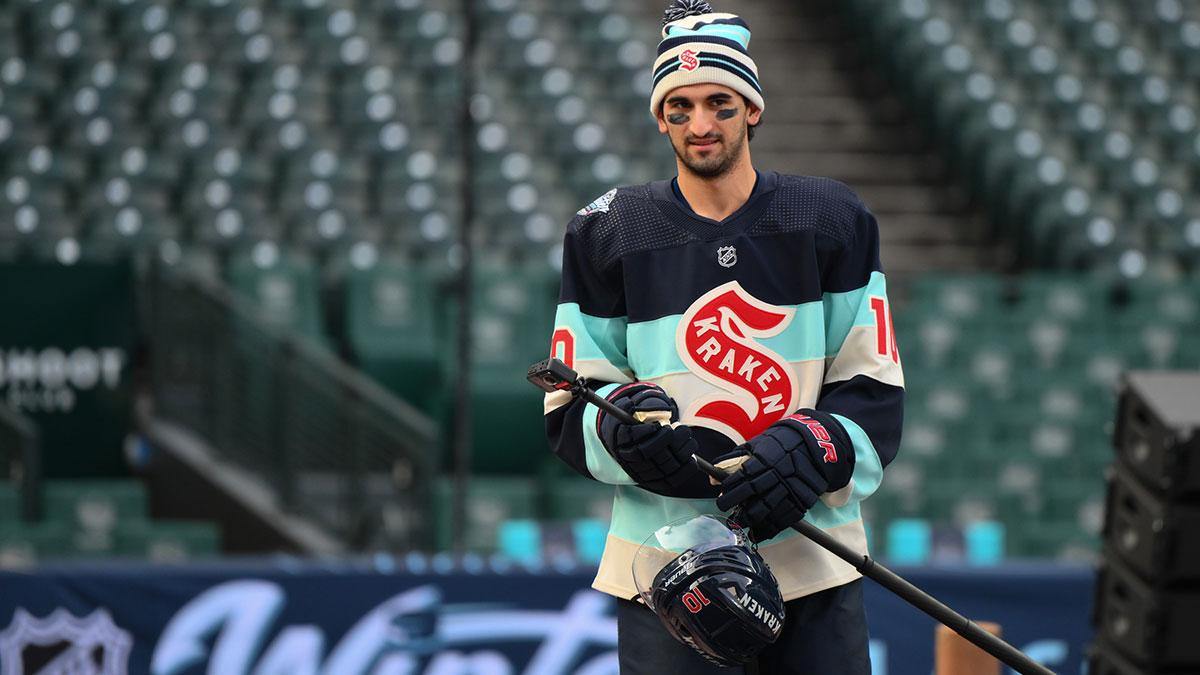 Seattle Kraken center Matty Beniers (10) walks towards the rink before a practice session before the 2024 Winter Classic ice hockey game at T-Mobile Park.