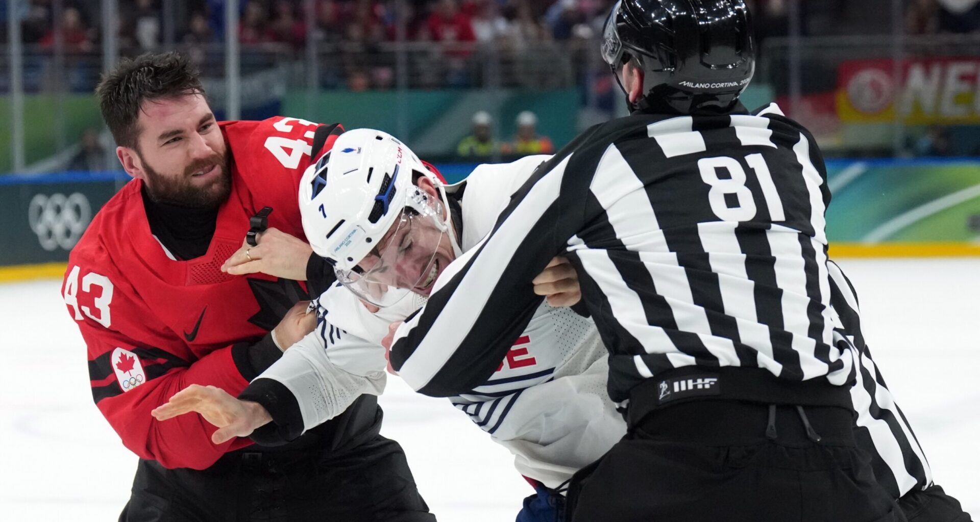 Tom Wilson fights in Canada’s game vs. France at the Olympics