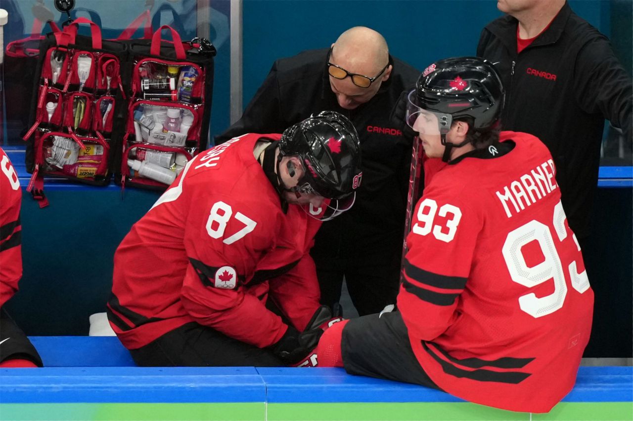Injured Canada captain Sidney Crosby's status uncertain for the Olympic gold medal game