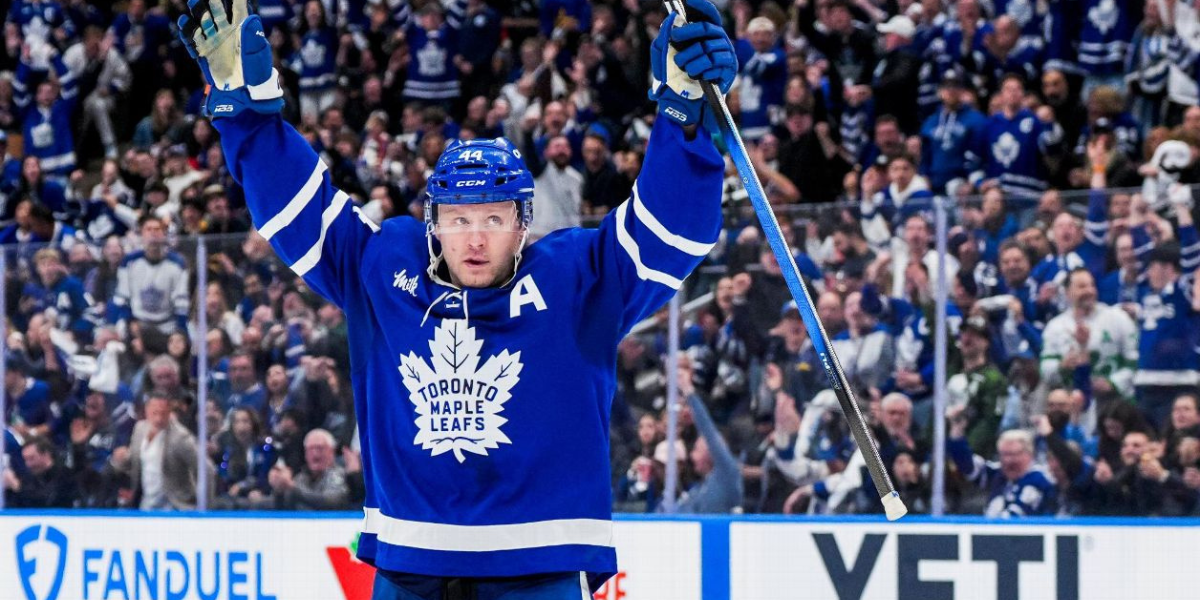 Morgan Rielly celebrating a goal for the Toronto Maple Leafs