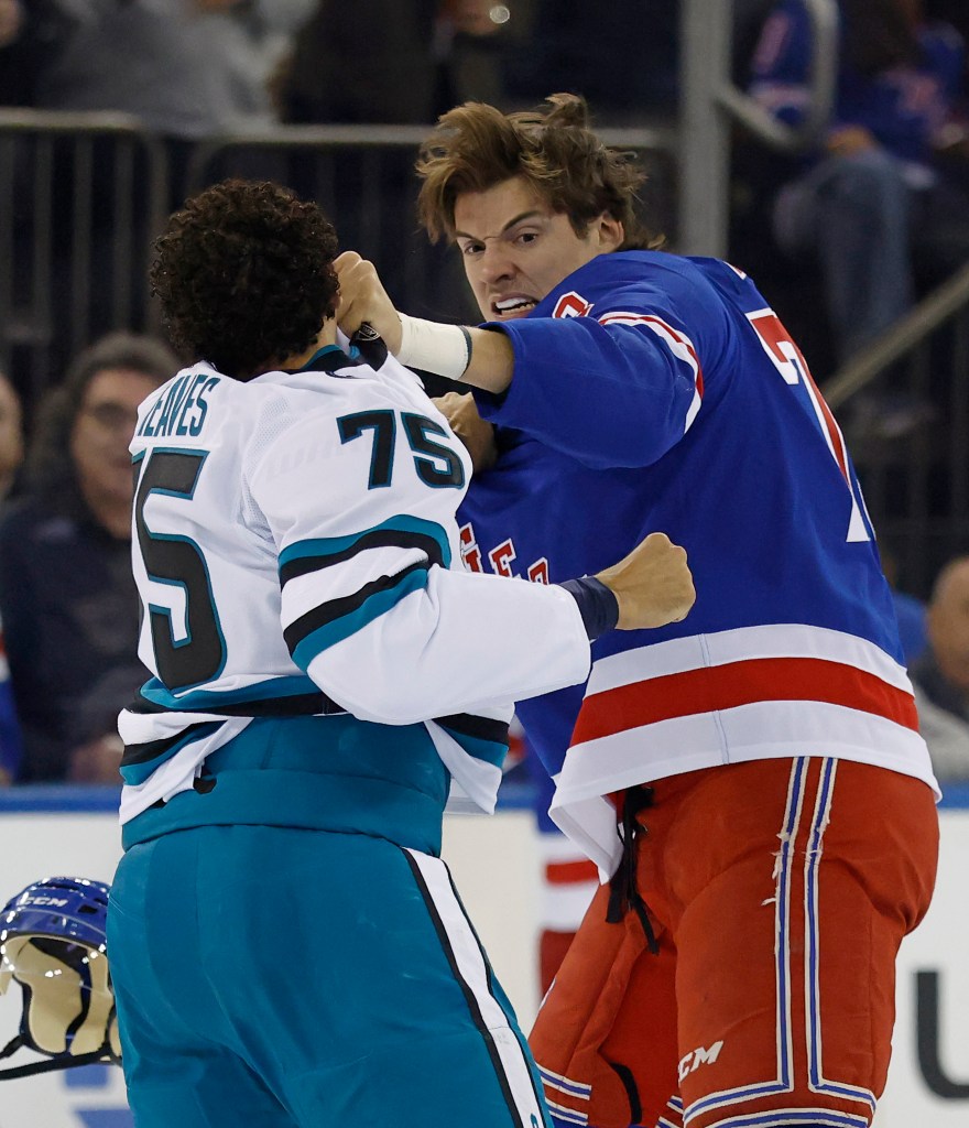New York Rangers center Matt Rempe and San Jose Sharks right wing Ryan Reaves get into a scuffle in the first period at Madison Square Garden in New York, October 23, 2025.