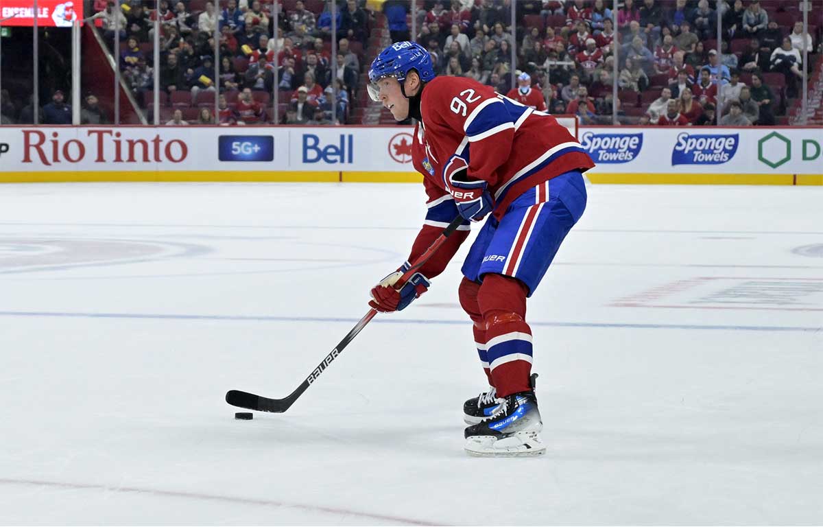 Montreal Canadiens forward Patrik Laine (92) plays the puck against the Philadelphia Flyers during the second period at the Bell Centre.