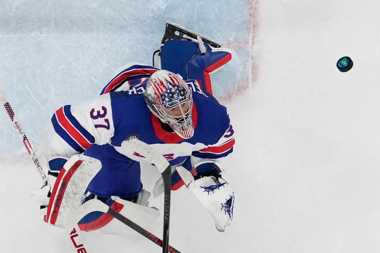 Connor Hellebuyck and Team USA will face either Sweden or Latvia in the quarterfinals on Wednesday.