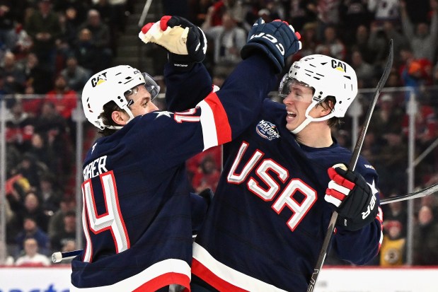 Wild teammates Brock Faber and Matt Boldy celebrate while playing for Team USA in the 4 Nations Face-Off