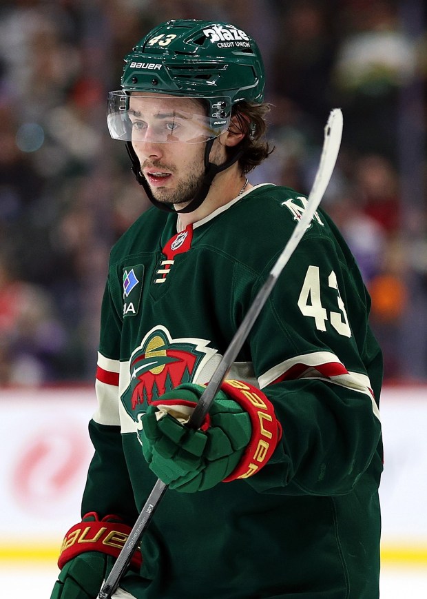 ST PAUL, MINNESOTA - DECEMBER 14: Quinn Hughes #43 of the Minnesota Wild looks on against the Boston Bruins in the second period at Grand Casino Arena on December 14, 2025 in St Paul, Minnesota. The Wild defeated the Bruins 6-2. (Photo by David Berding/Getty Images)