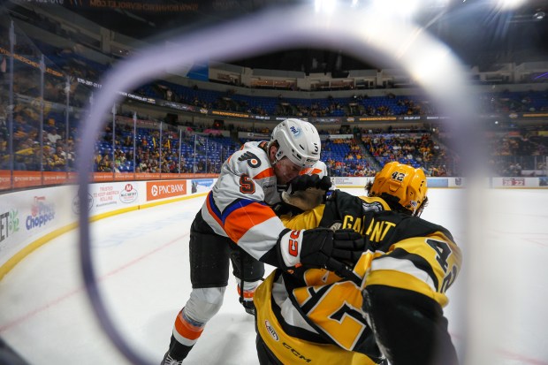 'Pens Zach Gallant is on the receiving end of a push during an AHL playoff game against the Lehigh Valley Phantoms on Wednesday, April 23, 2025. (JASON ARDAN / STAFF PHOTOGRAPHER)