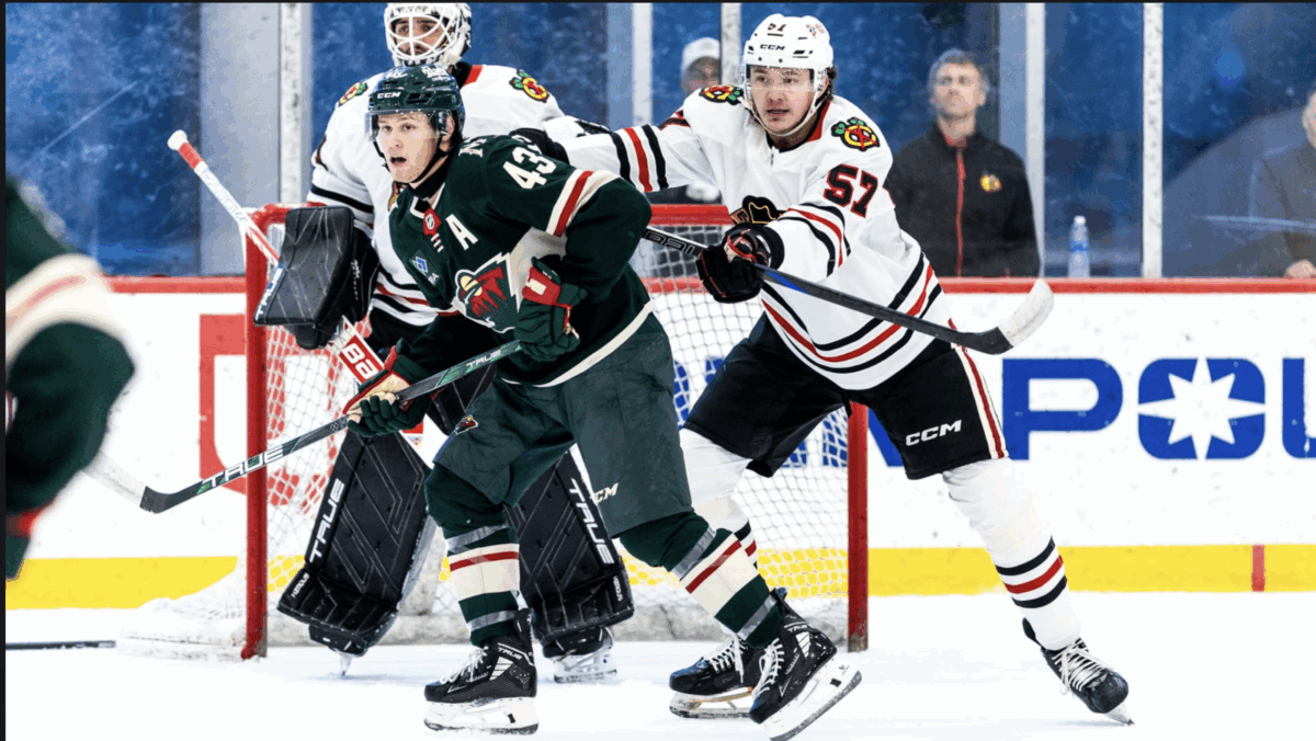 Ashton Cumby battles net front vs the Minnesota Wild. September 14, 2025