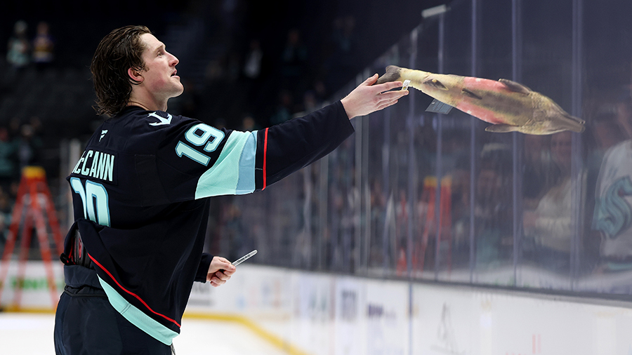 Seattle Kraken Jared McCann salmon toss April 2025...