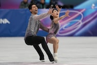 Emily Chan and Spencer Akira Howe of the United States compete during the pairs figure...