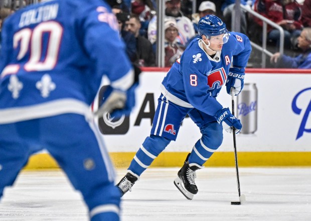 Cale Makar (8) of the Colorado Avalanche handles the puck against the Toronto Maple Leafs during the first period at Ball Arena on Monday, Jan. 12, 2026. (Photo by AAron Ontiveroz/The Denver Post)