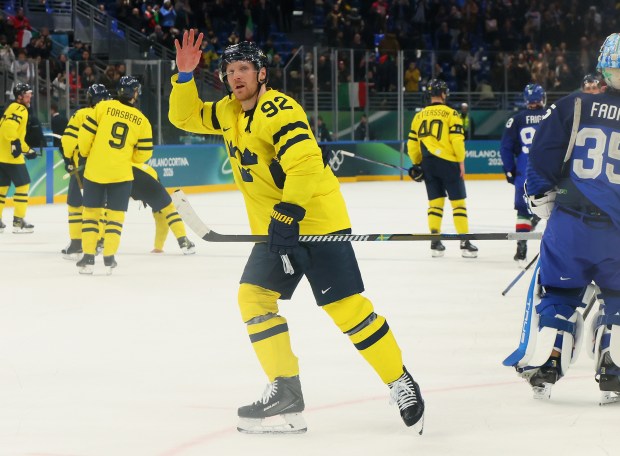 Gabriel Landeskog #92 of Team Sweden acknowledges the fans after the team's 5-2 victory in the Men's Preliminary Group B match between Sweden and Italy on day five of the Milano Cortina 2026 Winter Olympic games at Milano Santagiulia Ice Hockey Arena on Feb. 11, 2026 in Milan, Italy. (Photo by Bruce Bennett/Getty Images)