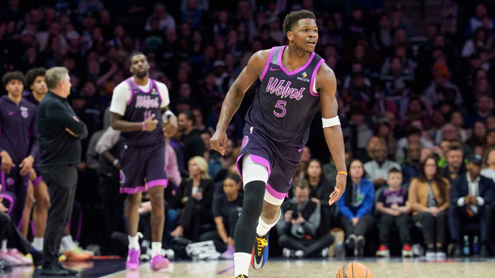 Minnesota Timberwolves guard Anthony Edwards (5) dribbles against the Dallas Mavericks in the third quarter at Target Center.