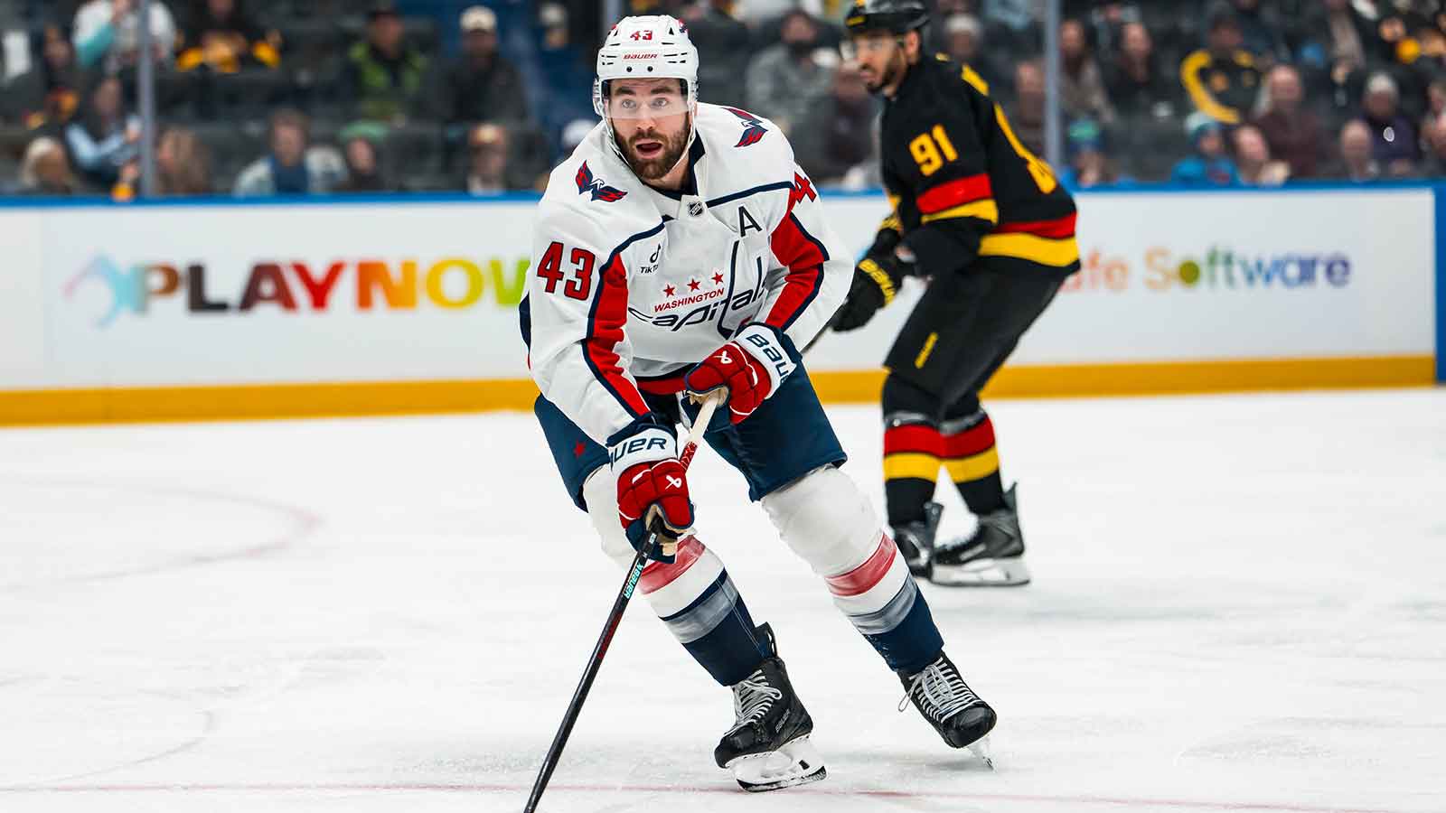 Washington Capitals forward Tom Wilson (43) handles the puck against the Vancouver Canucks in the third period at Rogers Arena. 