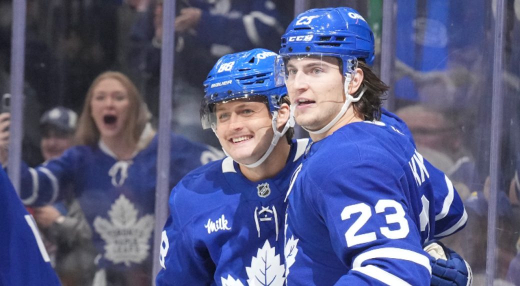 Matthew Knies and William Nylander celebrating a Toronto Maple Leafs goal