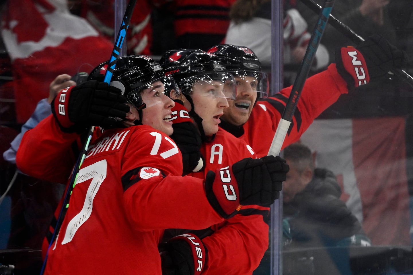 Colorado Avalanche star Nathan MacKinnon (center) scored the go-ahead goal for Team Canada with 35.2 seconds remaining in regulation.
