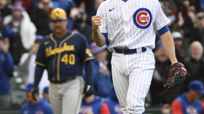 Apr 7, 2022; Chicago, Illinois, USA; Chicago Cubs relief pitcher David Robertson (37) reacts at the end of the game against the Milwaukee Brewers at Wrigley Field.