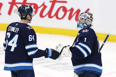 Logan Stanley & Eric Comrie, Winnipeg Jets