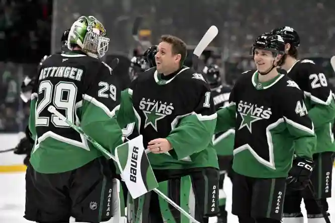 Dec 7, 2025; Dallas, Texas, USA; Dallas Stars goaltender Jake Oettinger (29) goaltender Casey Desmith (1) and defenseman Vladislav Kolyachonok (44) celebrate after the Stars defeat the Pittsburgh Penguins at American Airlines Center. Mandatory Credit: Jerome Miron-Imagn Images