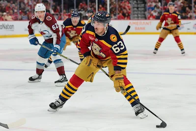 Florida Panthers forward Brad Marchand skates with the puck during 2026 game. Florida Panthers forward Brad Marchand skates with the puck during 2026 game.