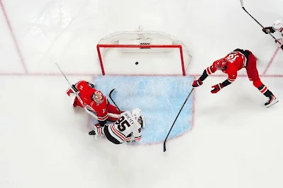 Carolina Hurricanes goalie Frederik Andersen lets in a goal