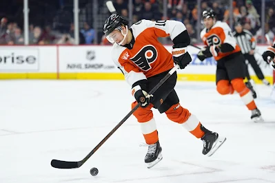 Philadelphia Flyers forward Bobby Brink skates with the puck during 2025 game. Philadelphia Flyers forward Bobby Brink skates with the puck during 2025 game.
