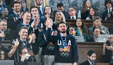 Feb 24, 2026; Washington, DC, USA; The United States Olympic Men’s Ice Hockey Team, Connor Hellebuyck in front, as President Donald J. Trump delivers the first State of the Union address of his second term to a joint session of Congress in the House Chamber of the United States Capitol in Washington on Tuesday