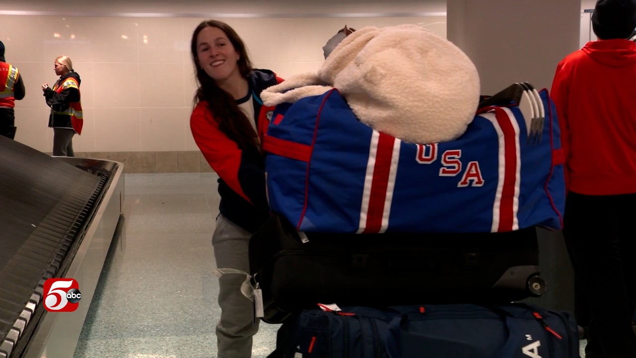 Gold medal-winning USA women's hockey players arrive home in Minnesota