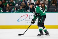 Dallas Stars defenseman Ilya Lyubushkin (46) skates with the puck during the second period...