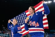 United States' Kendall Coyne, left, and United States' Hilary Knight celebrate after victory...
