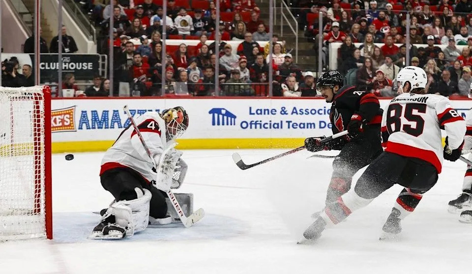  Seth Jarvis of the Carolina Hurricanes gets the puck past James Reimer of the Ottawa Senators for a goal during the second period on Tuesdday, Feb. 3, 2026 in Raleigh, N.C.