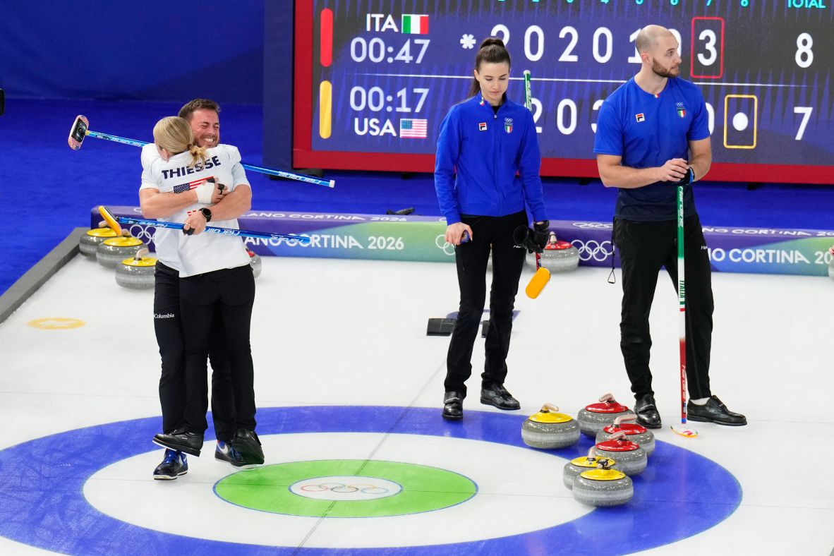 American curlers Korey Dropkin and Cory Thiesse celebrate after defeating Italy's Amos Mosaner and Stefania Constantini in <a href=