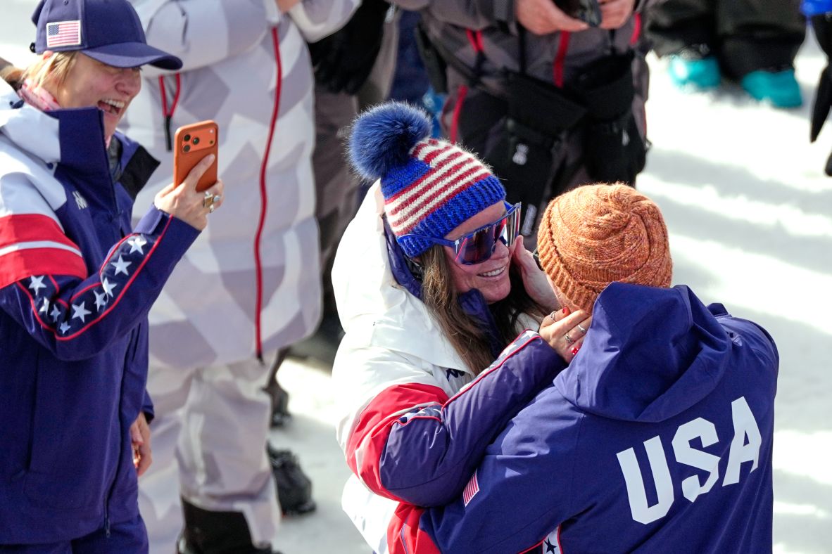 US skiing star Breezy Johnson looks at her fiancé, Connor Watkins, after <a href=