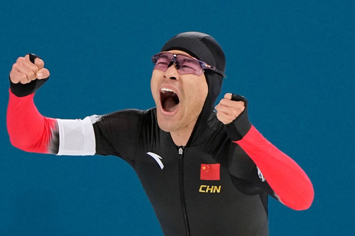 Ning Zhongyan of China celebrates after competing in the men's 1500m speedskating race on February 19. <a href=
