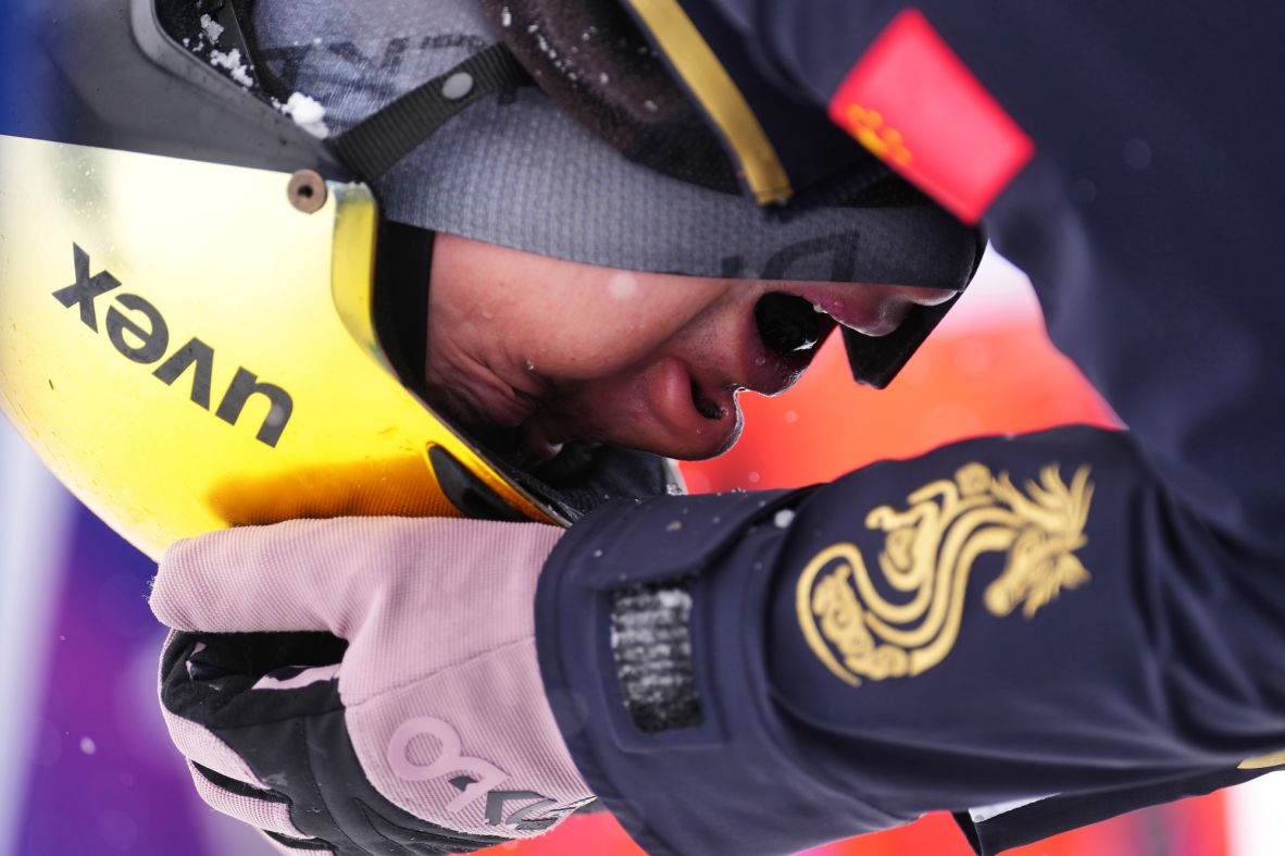 China's Li Tianma reacts after crashing during the freestyle skiing mixed team aerials final on February 21.