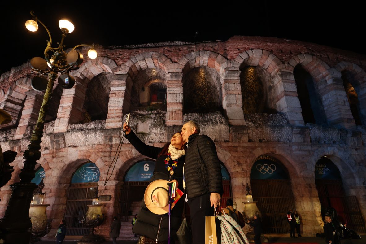 People take a selfie outside the Verona Arena, a World Heritage site that dates to the year 30 AD.