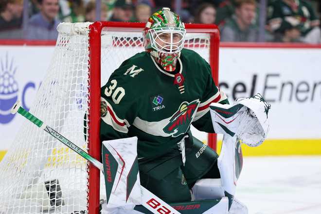 Minnesota Wild goaltender Jesper Wallstedt (30) defends his net against the Anaheim Ducks during the second period of an NHL hockey game, Saturday, Nov. 15, 2025, in St. Paul, Minn. (AP Photo/Matt Krohn)