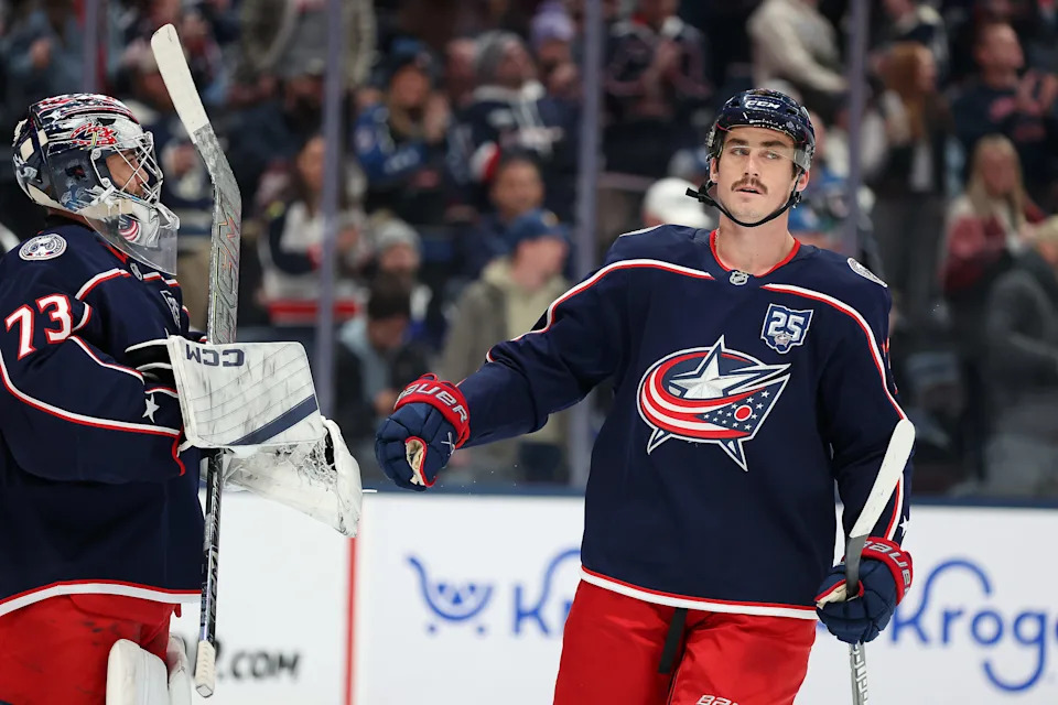 Jan 24, 2026; Columbus, Ohio, USA; Columbus Blue Jackets center Cole Sillinger (4) celebrates his goal with goaltender Jet Greaves (73) during the first period against the Tampa Bay Lightning at Nationwide Arena. Mandatory Credit: Joseph Maiorana-Imagn Images