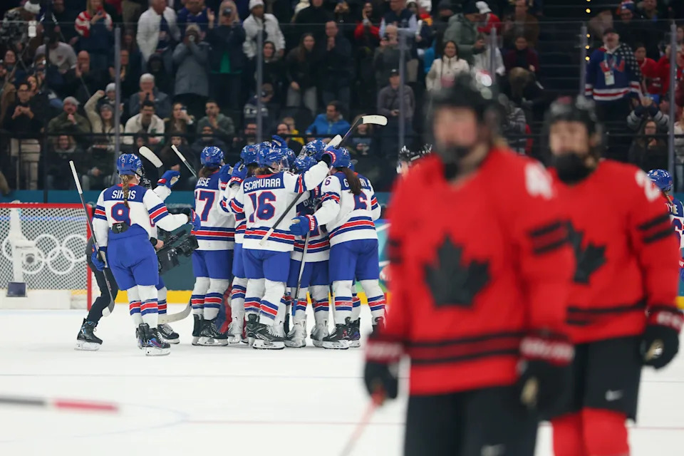MILAN, ITALY - FEBRUARY 10: Players of Team United States celebrate the team's 5-0 victory in the Women's Preliminary Group A match between United States and Canada on day four of the Milano Cortina 2026 Winter Olympic games at Milano Santa Giulia Ice Hockey Arena on February 10, 2026 in Milan, Italy. (Photo by Gregory Shamus/Getty Images)