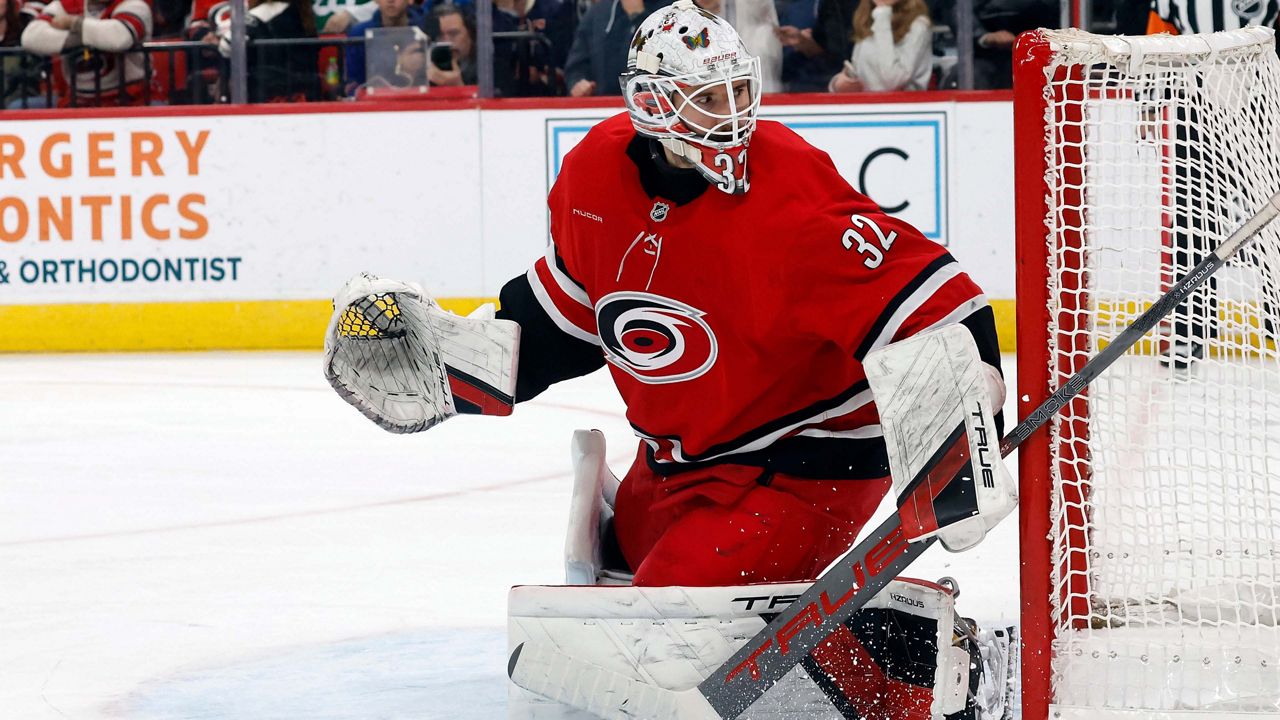 FILE - Carolina Hurricanes goaltender Brandon Bussi watches the puck during the third period of an NHL hockey game against the New York Rangers in Raleigh, N.C., Dec. 29, 2025. (AP Photo/Karl DeBlaker, File)