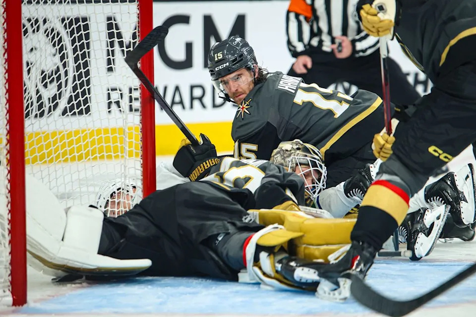 Vegas Golden Knights D Noah Hanifin (15) reacts to a save made by teammate Vegas Golden Knights G Akira Schmid (40) during an NHL game against the Vancouver Canucks on Wednesday February 4, 2026, in Las Vegas, Nevada. 