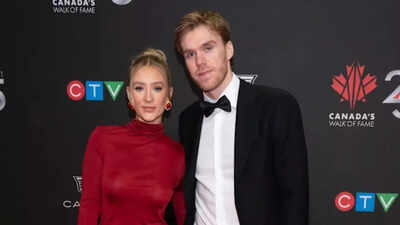 Connor McDavid’s wife Lauren Kyle turns heads in bold red at Canada’s Olympic opener