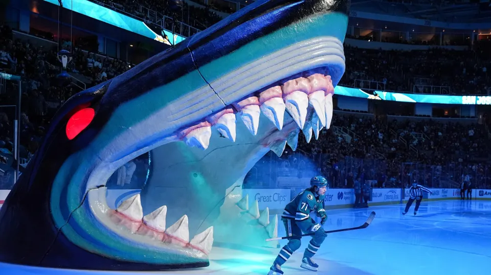 Macklin Celebrini of the San Jose Sharks takes the ice through the Shark Head