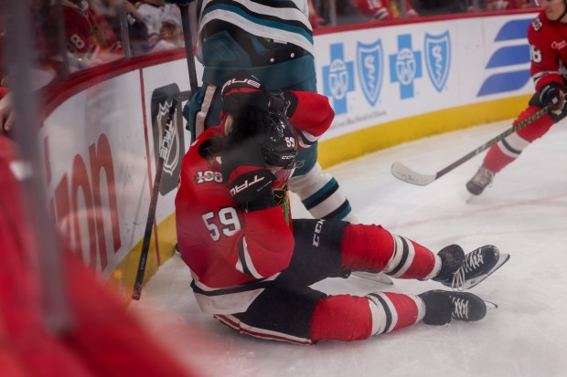 Chicago Blackhawks left wing Tyler Bertuzzi (59) falls on the ice during the first period against the San Jose Sharks at the United Center Monday Feb. 2, 2026 in Chicago. (Armando L. Sanchez/Chicago Tribune)