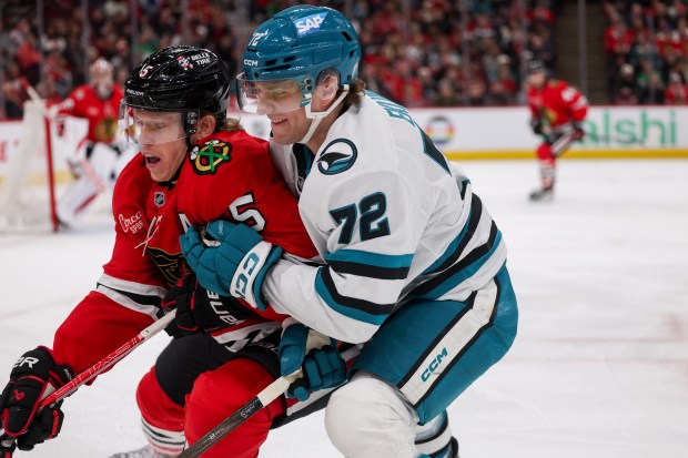 San Jose Sharks left wing William Eklund (72) guards Chicago Blackhawks defenseman Connor Murphy (5) during the second period at the United Center Monday Feb. 2, 2026 in Chicago. (Armando L. Sanchez/Chicago Tribune)