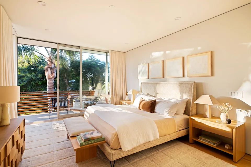 A sun-soaked primary bedroom has a private terrace overlooking the Walk Streets. <span class="image-credit">(Engles Studios)</span>