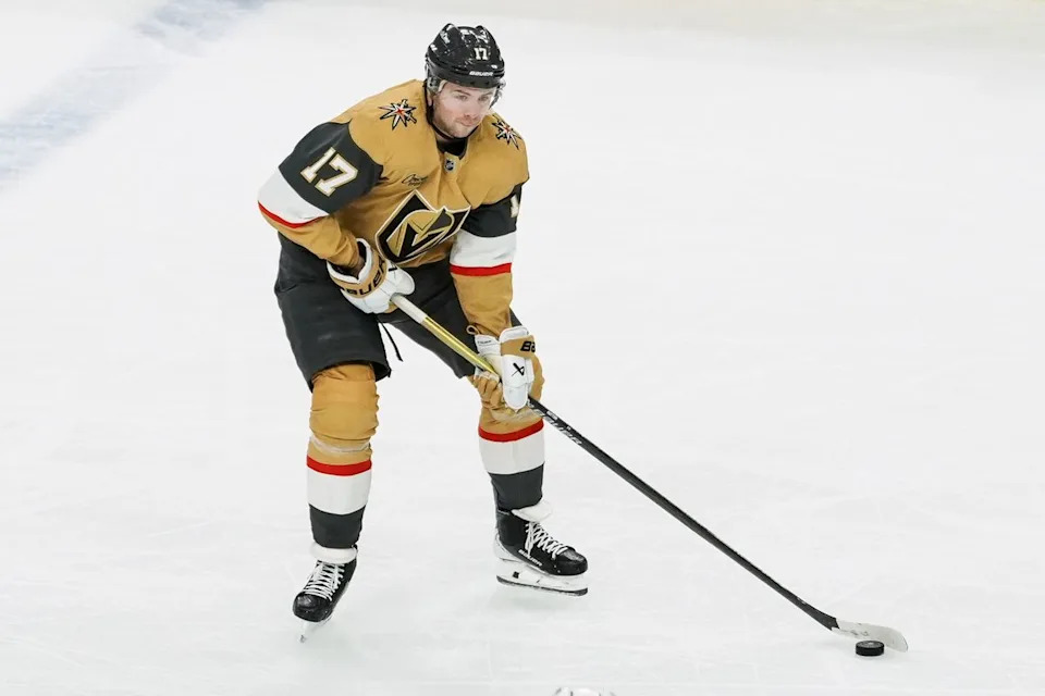 Golden Knights defensemen Ben Hutton (17) skates the puck down the ice during second period of NHL game against Dallas Stars on Thursday Jan. 29, 2026 at T-Mobile Arena in Las Vegas.