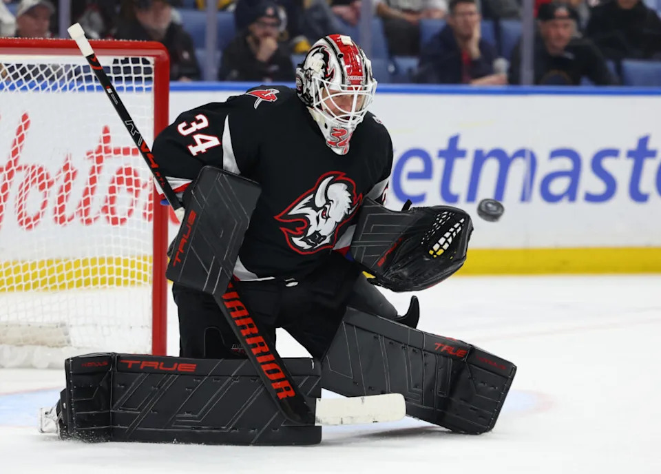 Feb 5, 2026; Buffalo, New York, USA; Buffalo Sabres goaltender Alex Lyon (34) looks to make a save during the third period against the Pittsburgh Penguins at KeyBank Center. Mandatory Credit: Timothy T. Ludwig-Imagn Images